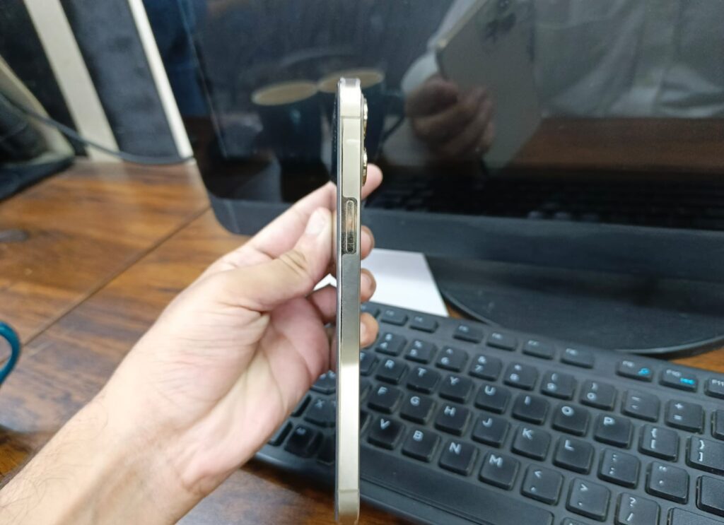 Close-up side view of Apple iPhone 12 Pro Max in stainless steel finish