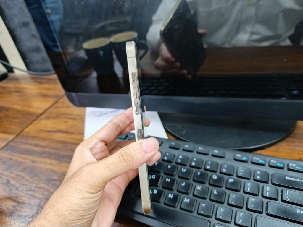 iPhone 12 Pro Max side view showing flat edges and stainless steel frame